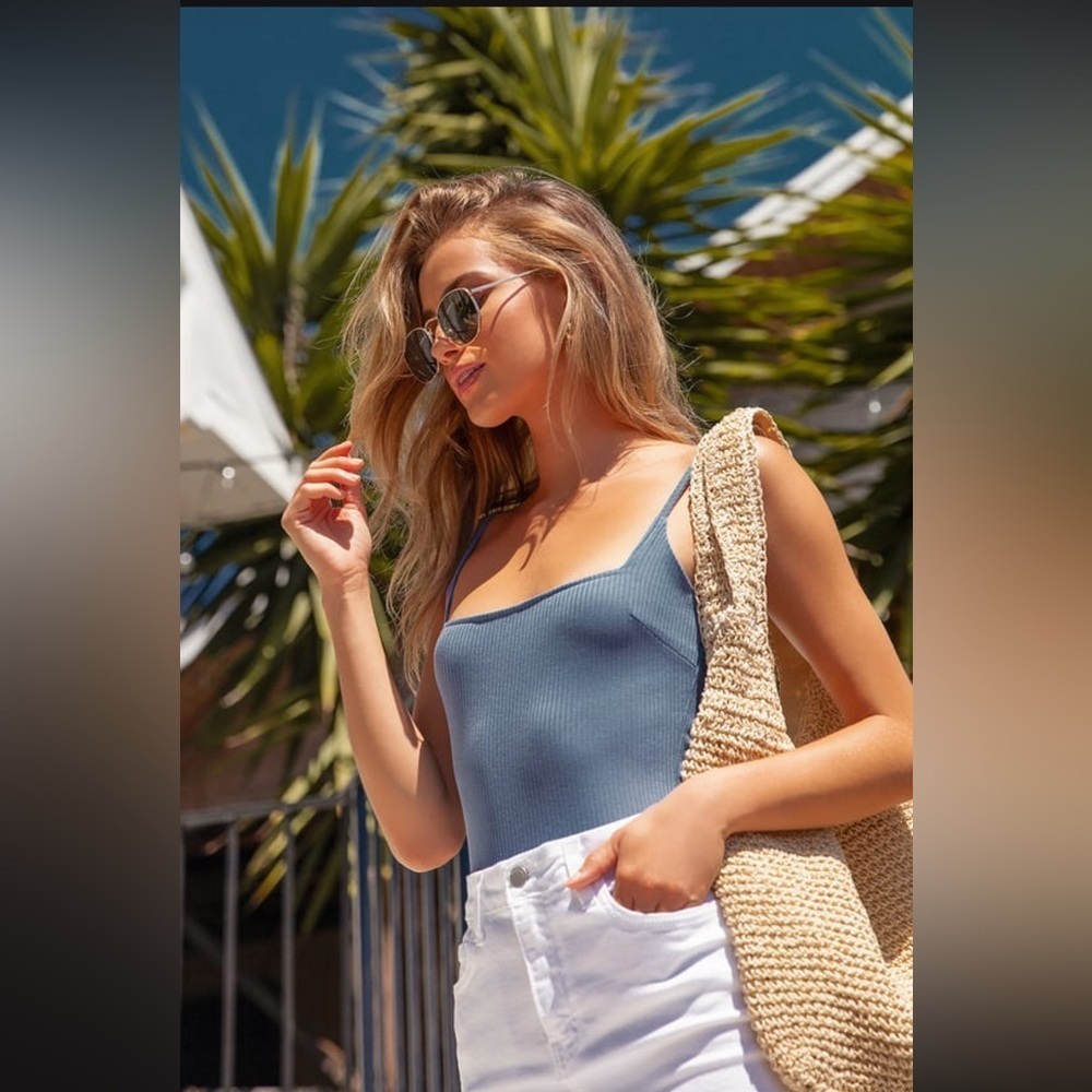 Danyelle Blue Ribbed Sleeveless
Bodysuit
Color: Blue
